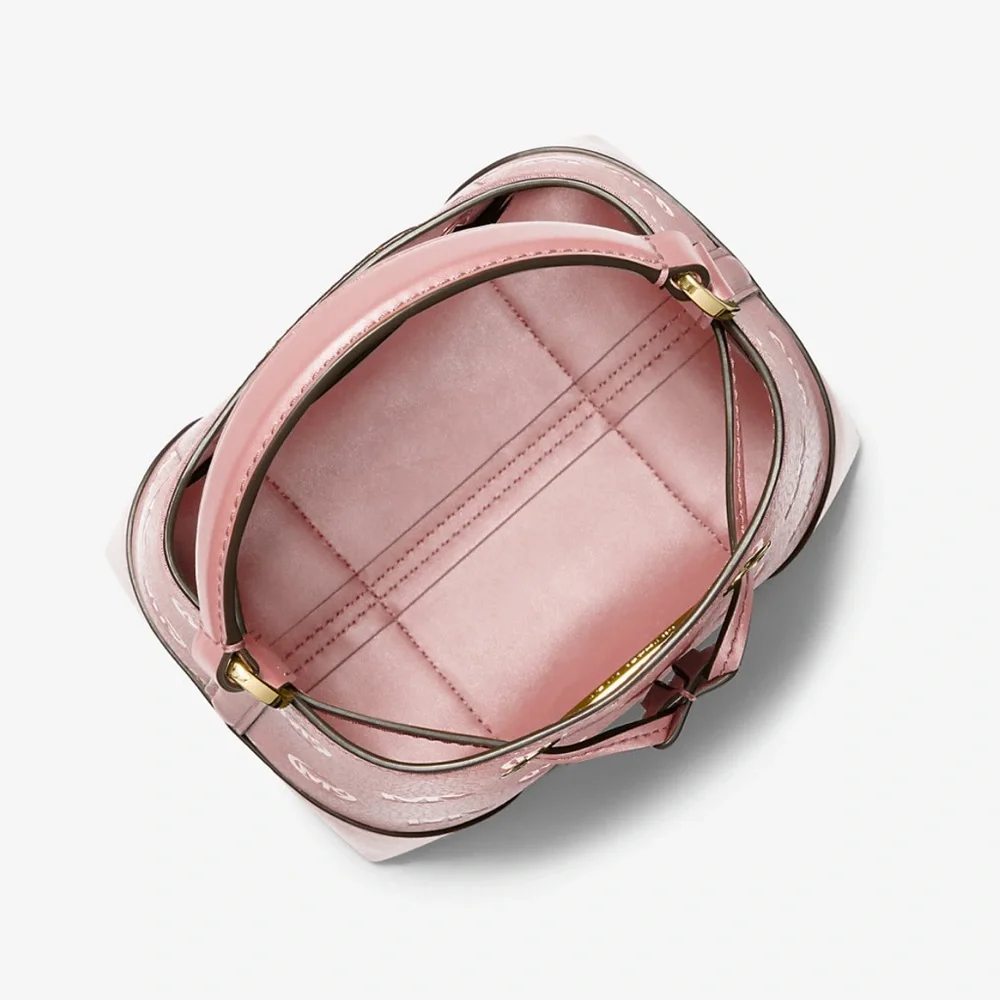 MICHAEL KORS
Mercer Small Logo Embossed Leather Bucket Bag
COLOR PRIMROSE 
NWT - Picture 2 of 4